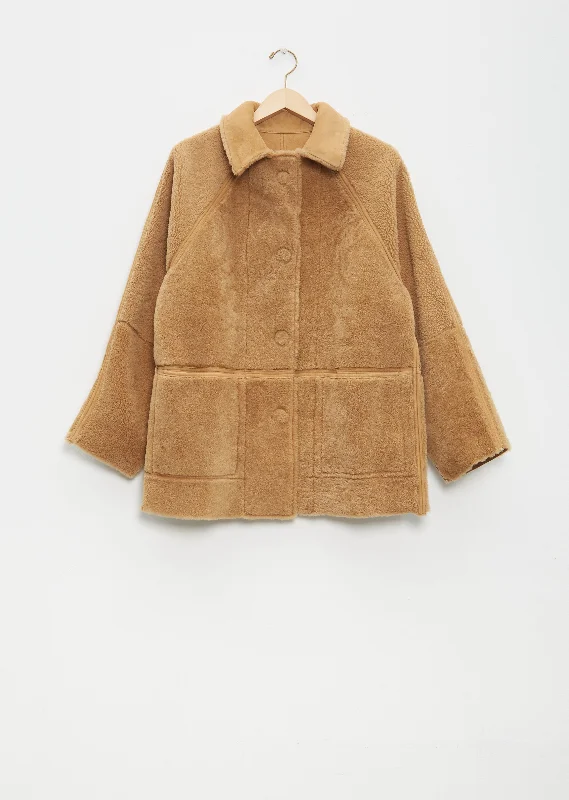 fw23ck010-kassl-original-hip-shearling-jacket